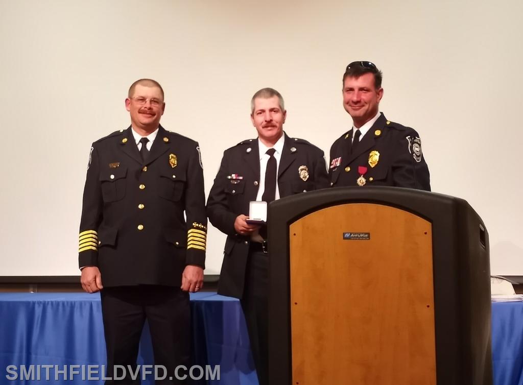 Firefighter Ryan Brown being presented the Jack Finley Training Award 
